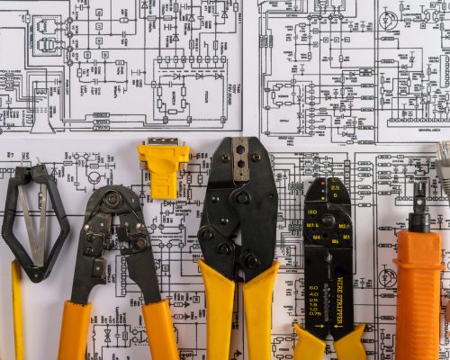 Different electrical tools on electrical engineering drawings . Top view.